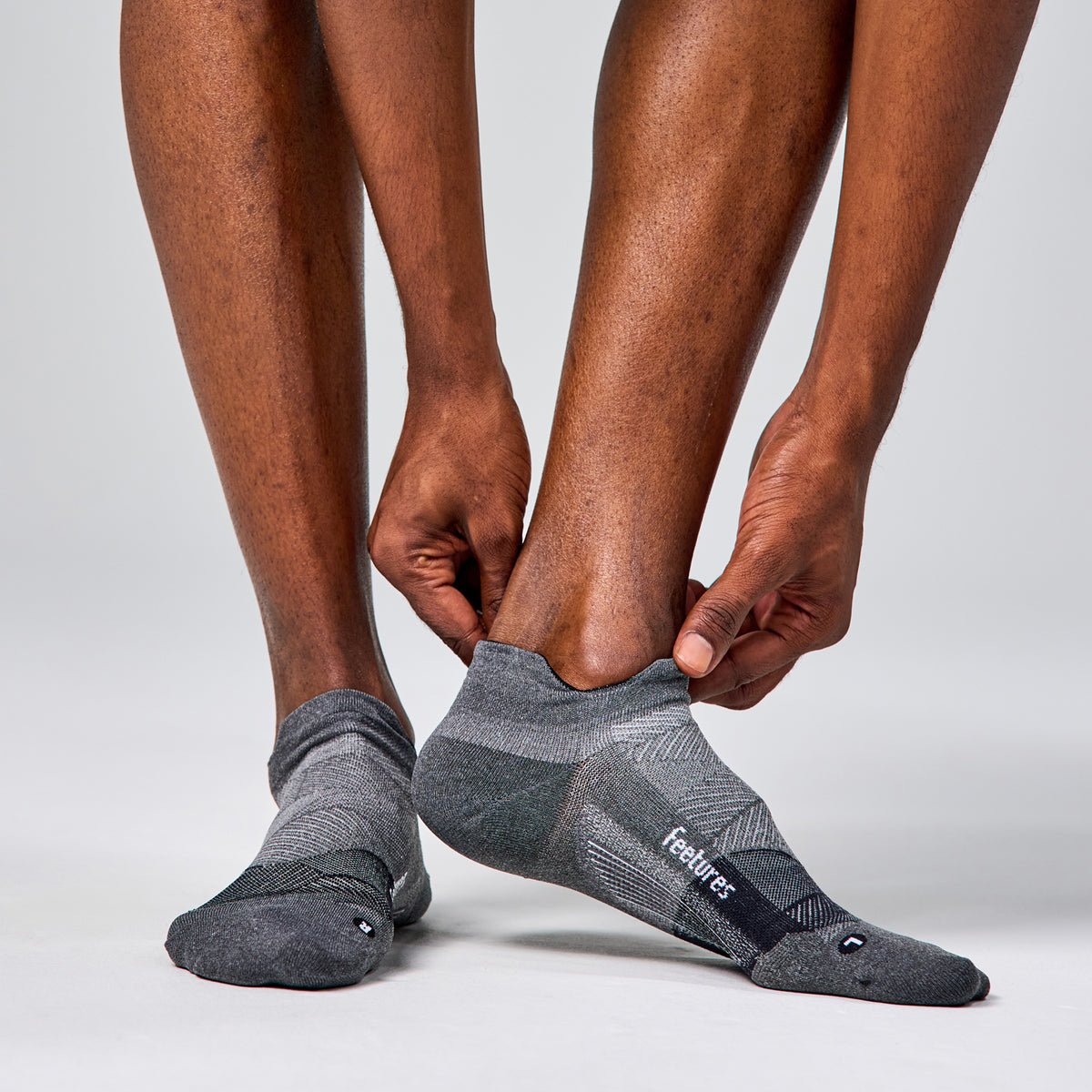 Feetures Elite Ultra Light Cushion Tab Socks